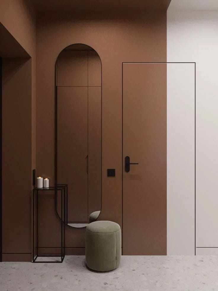 Salon moderne avec couleur Mocha Mousse sur les murs, créant une ambiance cosy et chaleureuse.