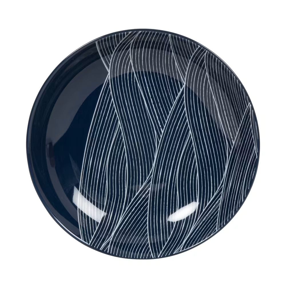 assiette creuse en porcelaine bleue motif vagues blanches