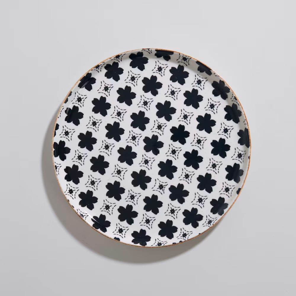 assiette céramique blanche motifs noirs