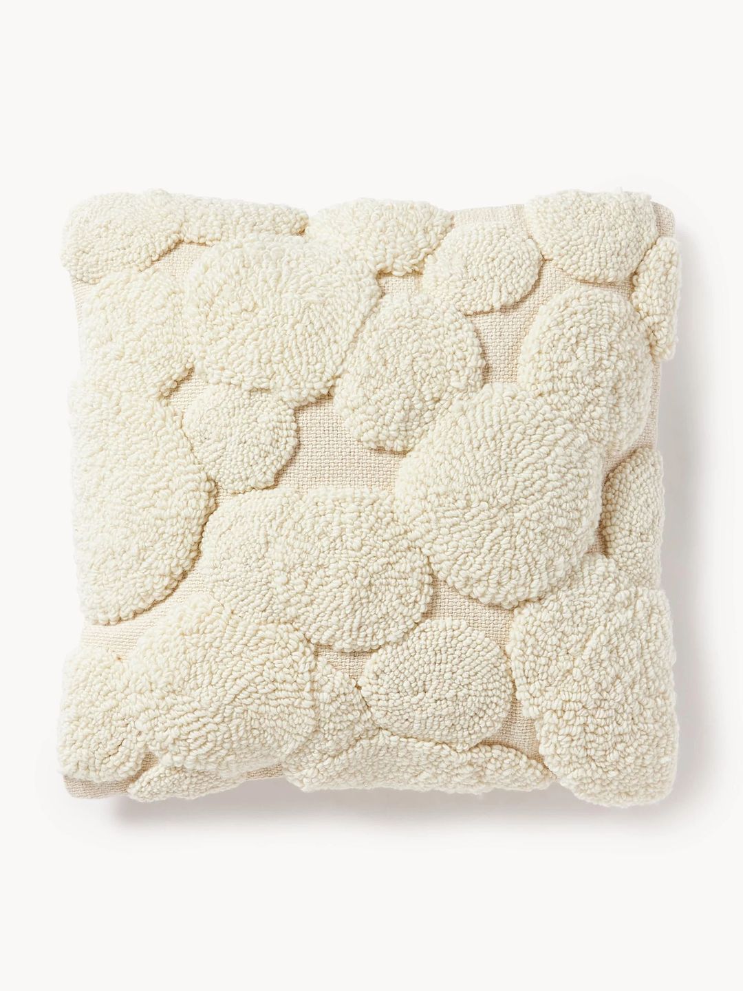 coussin beige bulles
