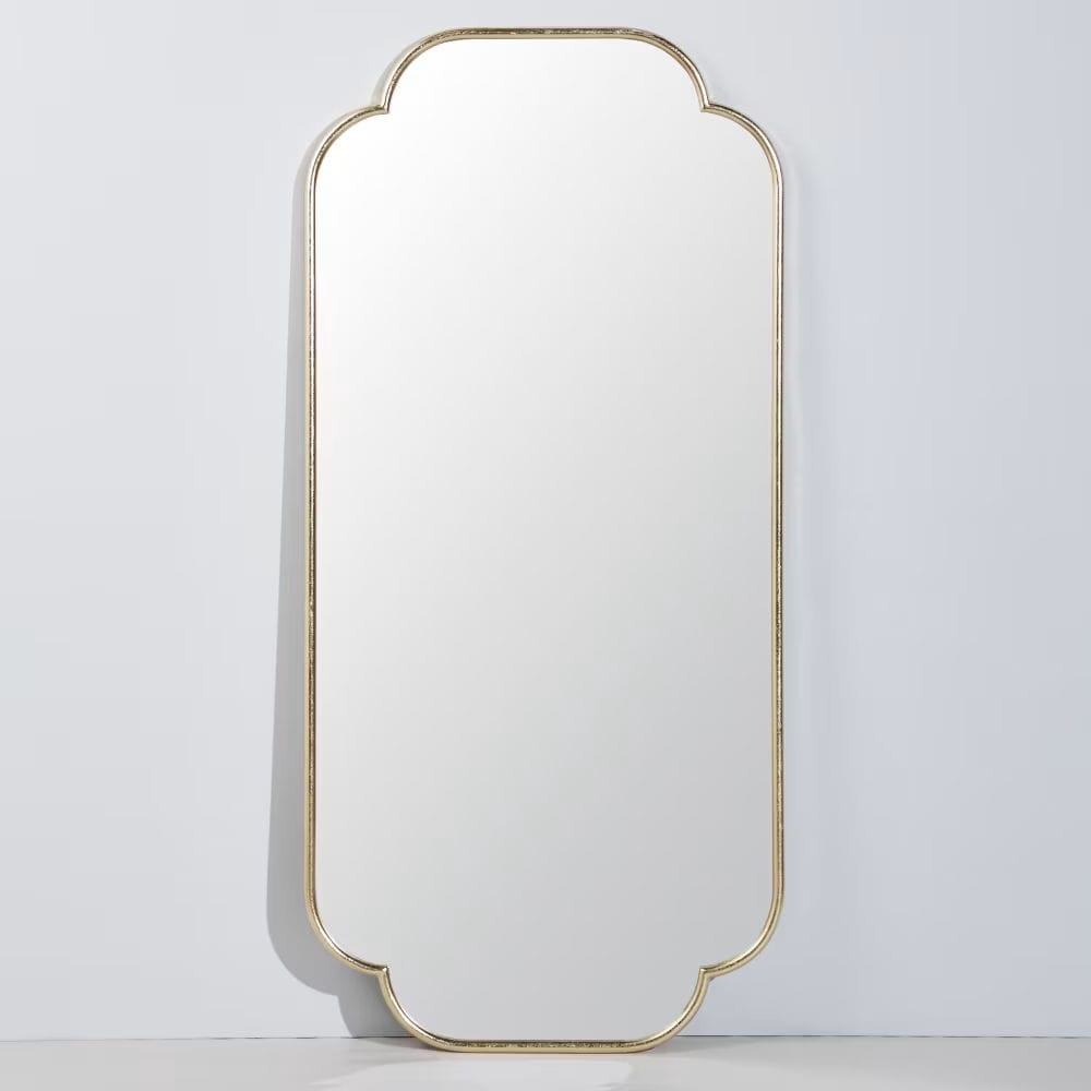 grand miroir destructuré en métal doré